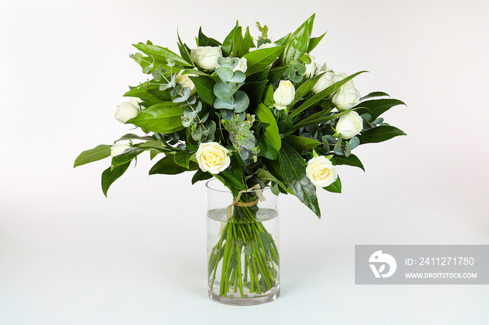 Bouquet of white  roses in vase isolated on white.