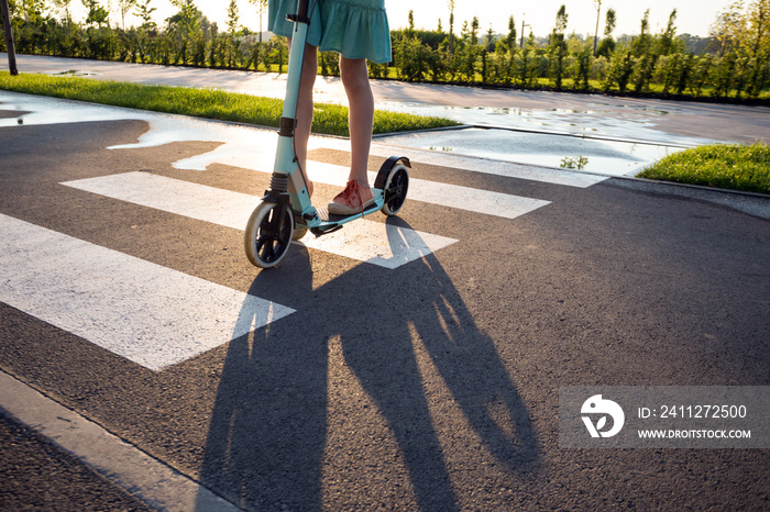 girl on a scooter