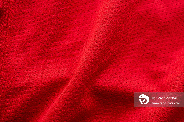 Red fabric sport clothing football jersey with air mesh texture background