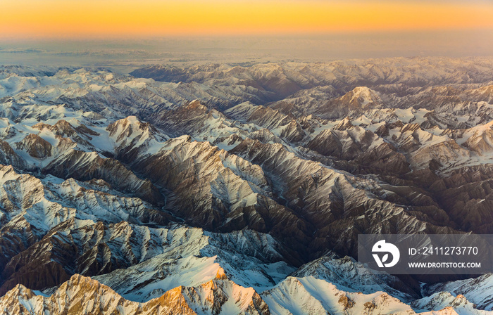 aerial of the mountains in Tashkent, china and Kirgistan, covere