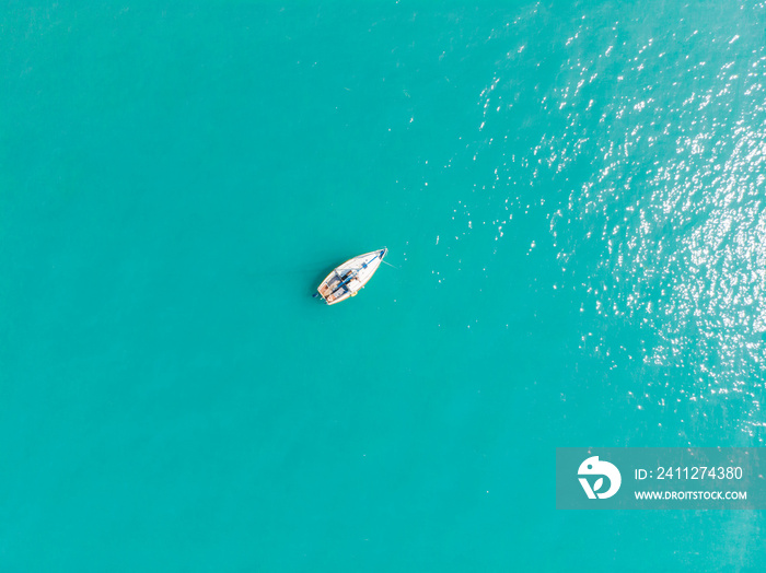 aerial view of boat in blue water