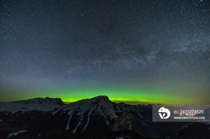 Beautiful green aurora dancing over Mt. Borgeau, Banff, Canada