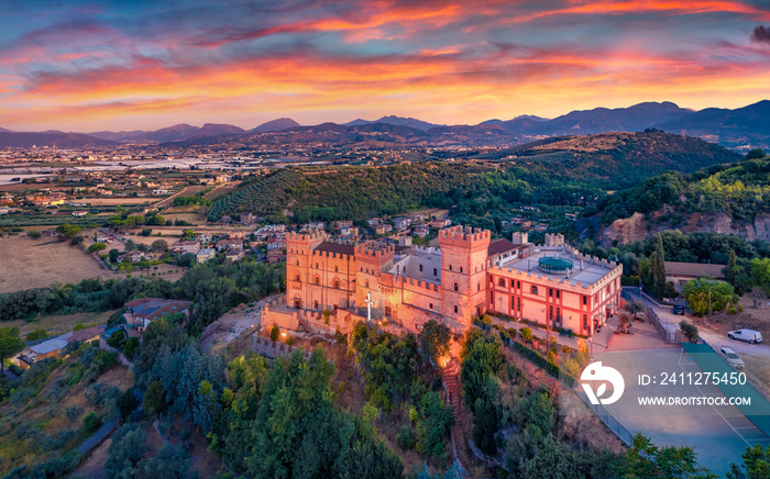 Majestic morning view from flying drone of Castelluccio Castle. Great sunrise on Battipaglia town, Italy, Europe. Traveling concept background.