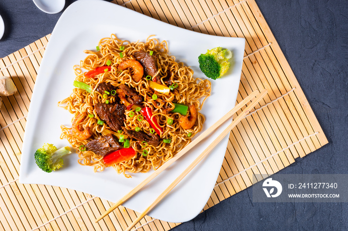 Fried Mie noodles with beef and vegetables.