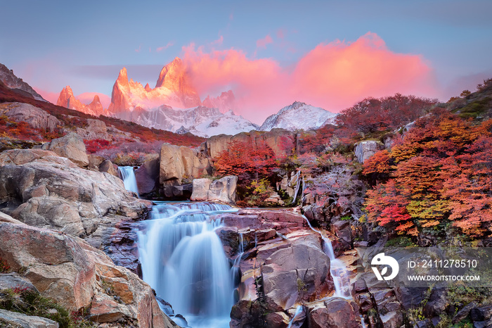 Amazing mount Fitz Roy and the waterfall at pink dawn, Los Glaciares National Park, Andes, Patagonia, Argentina