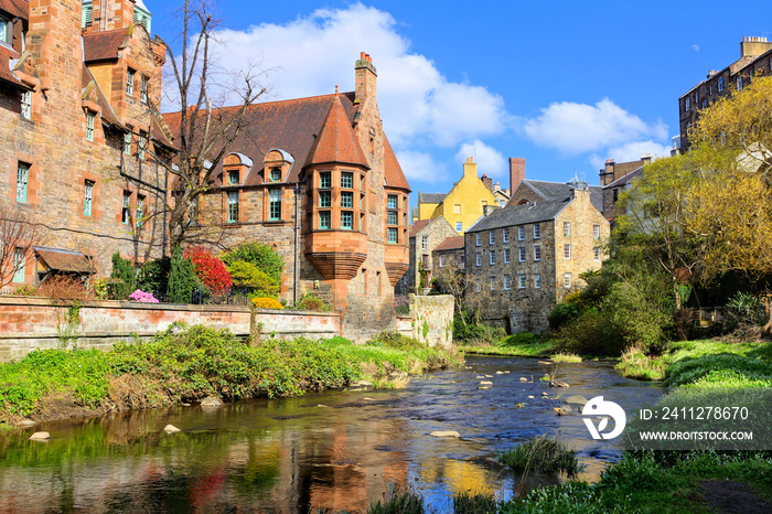 Beautiful Dean Village of Edinburgh, Scotland with reflections in the Water of Leith