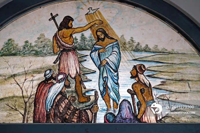 Baptism of the Lord, stained glass in the Catholic cathedral of Immaculate Heart of Mary and St. Teresa of Calcutta in Baruipur, West Bengal, India