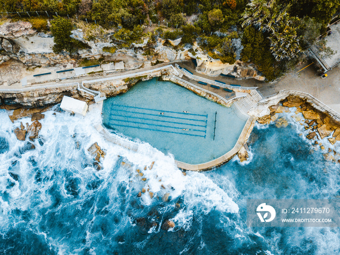 Aerial drone photography shot of the beautiful bronte ocean pool located in sydney, Australia