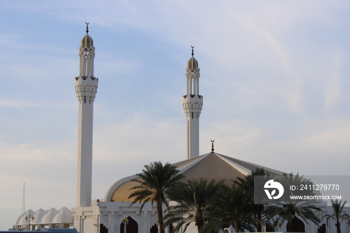 Beautiful front view of the entrance of Hassan En any Mosque at sunset in Jeddah, Saudi Arabia. Islamic architecture and culture.