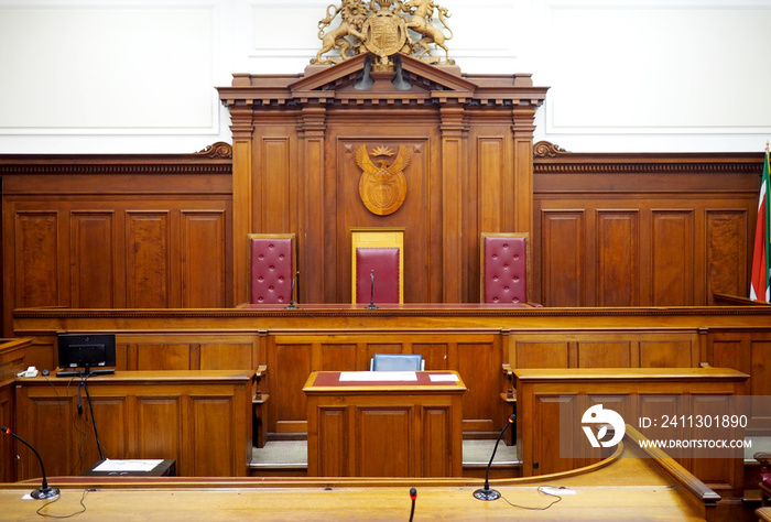 Empty courtroom, with old wooden paneling