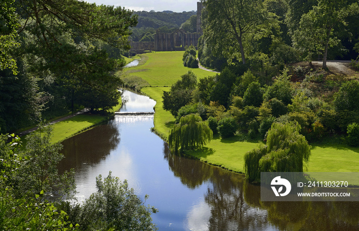 England, North Yorkshire, Ripon. Fountains Abbey, Studley Royal - UNESCO World Heritage Site. Grounds, garden buildings and trees of Water Park.