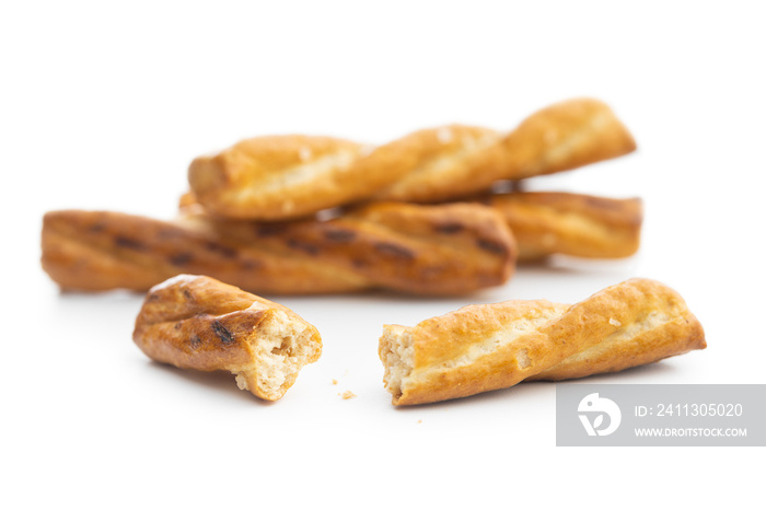 Salted pretzel sticks. Salted crackers isolated on white background.