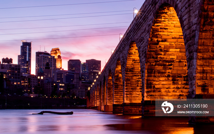 Stone Arch Bridge under autumn sunset