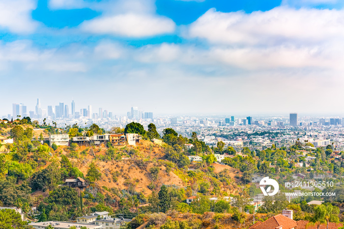 Urban views of the Beverly Hills area and residential buildings on the Hollywood hills.