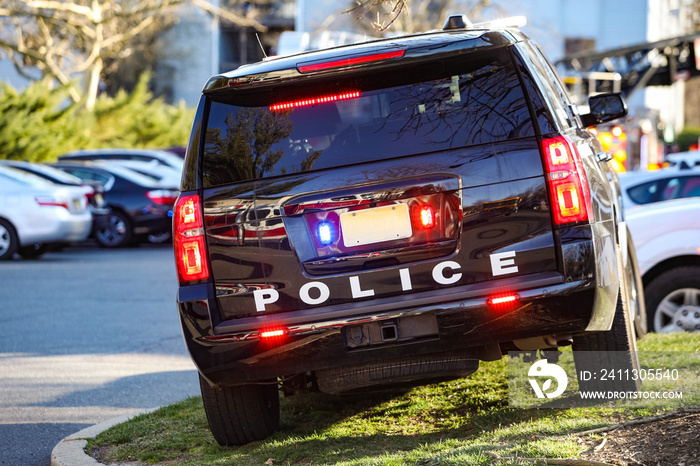 Police car with sirens and lights on during emergency service