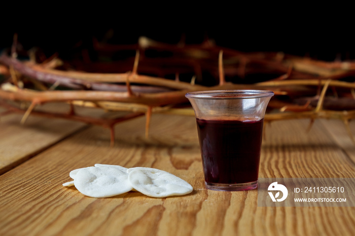 Holy Communion, a Cup of Wine and Bread with a Jesus Crown Thorn and Holy Bible