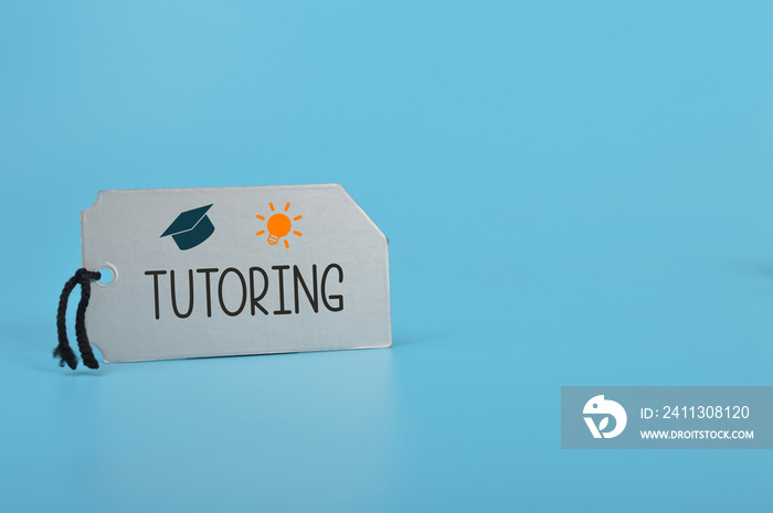 Silver card written with TUTORING. Tutoring provides a personalized and tailored approach to learning, helping students to overcome their difficulties, build confidence and achieve their academic