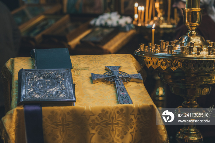 Church ordinance orthodox and wedding, church wedding, religious of a child in church, icons, Orthodox church, candles, interior of the Orthodox Church, bible, font