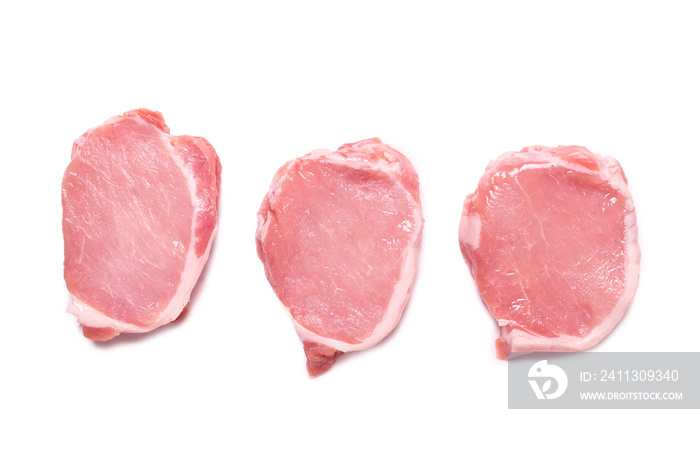 Raw pork pieces isolated on a white background.