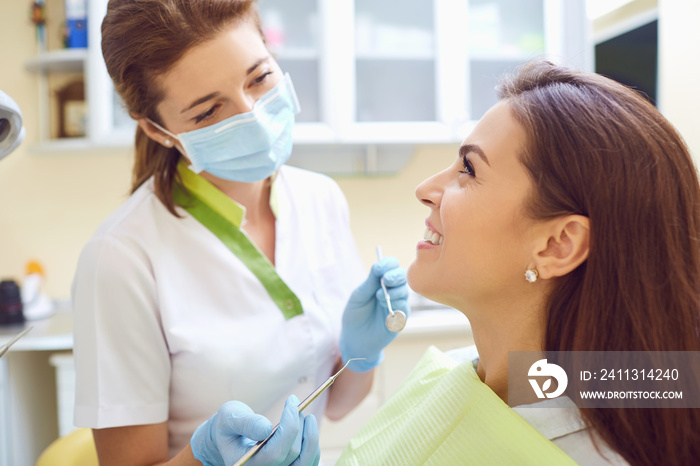 A girl and a dentist in a dental clinic