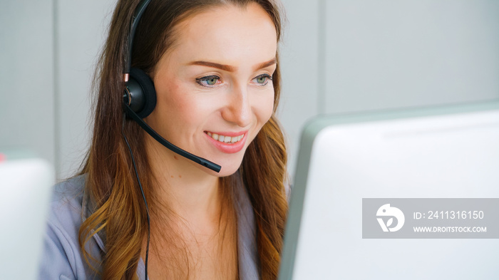 Business people wearing headset working in office to support remote customer or colleague. Call center, telemarketing, customer support agent provide service on telephone video conference call.