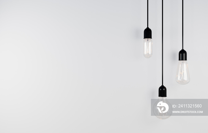 Vintage hanging light bulb on light background. 3d rendering