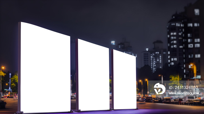 Vertical standing empty billboards or standee mockups at event place, Outdoor Event advertisment placard, Vertical blank standee in city in night