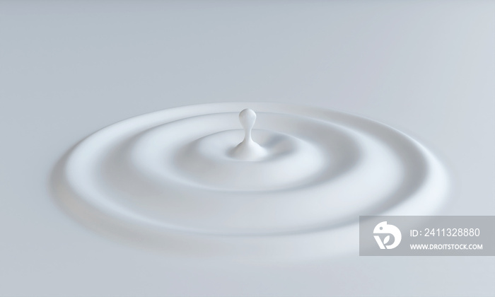 A drop of milk is shown on a white surface.