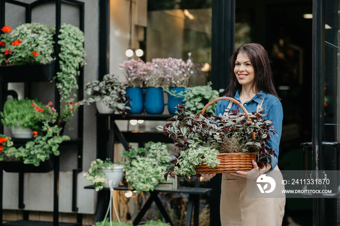 Work of gardener seller in flower studio and plant care, create design of store outdoor