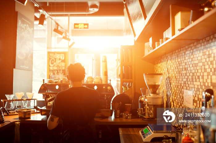 Barista at work in a coffee shop