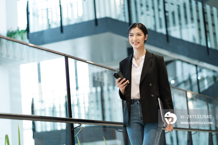 Portrait of a beautiful young Asian businesswoman at the company