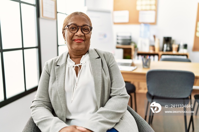 Senior african american woman business worker smiling confident at office