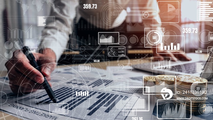 Big Data Technology for Business Finance Analytic conceptual. Modern graphic interface shows massive information of business sale report, profit chart and stock market analysis on screen monitor.