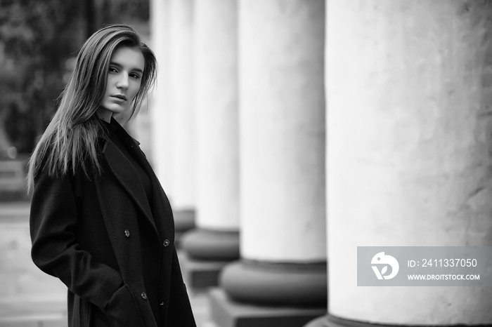 Girl in a coat black and white photo