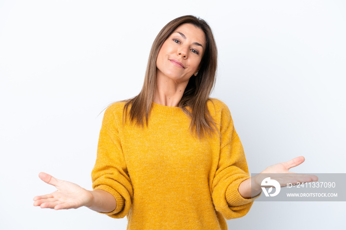 Middle age caucasian woman isolated on white background having doubts