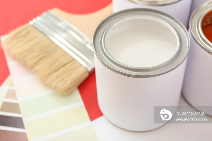 Can of paint on color background, closeup