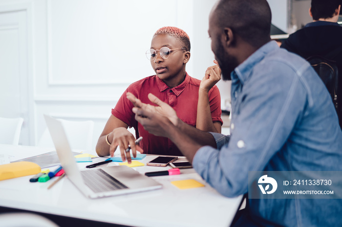 Black female consultant giving advice to male client