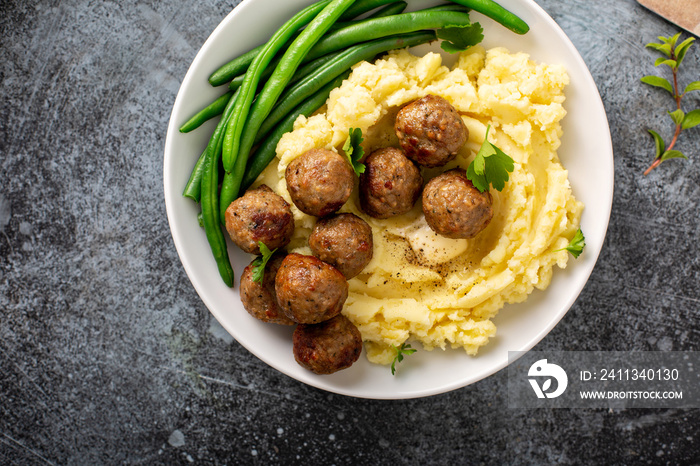 Swedish meatballs with mashed potatoes and green beans