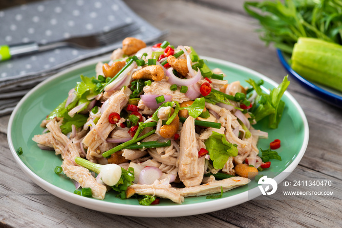 Steamed rip chicken spicy salad with shallot, celery, chili and Scallion.