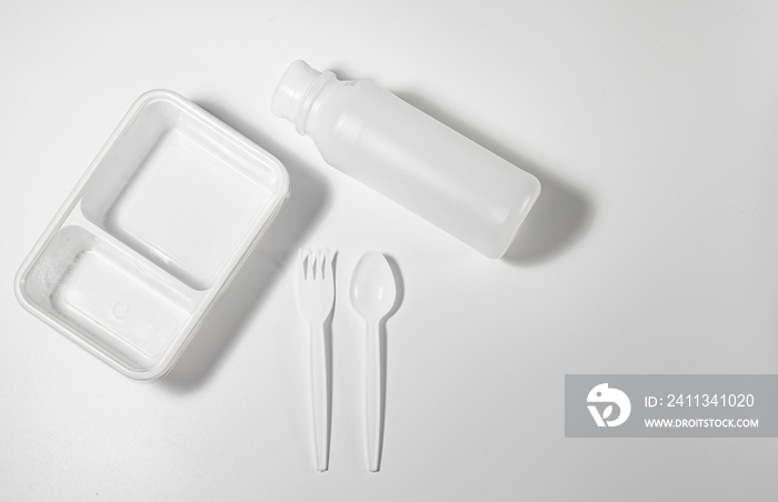 Stop using plastic. Plastic waste collection Plate, bowl, Spoon and fork, lunch box, bottle Made of Plastic. Concept of Recycling plastic and ecology problem (Environment concept).