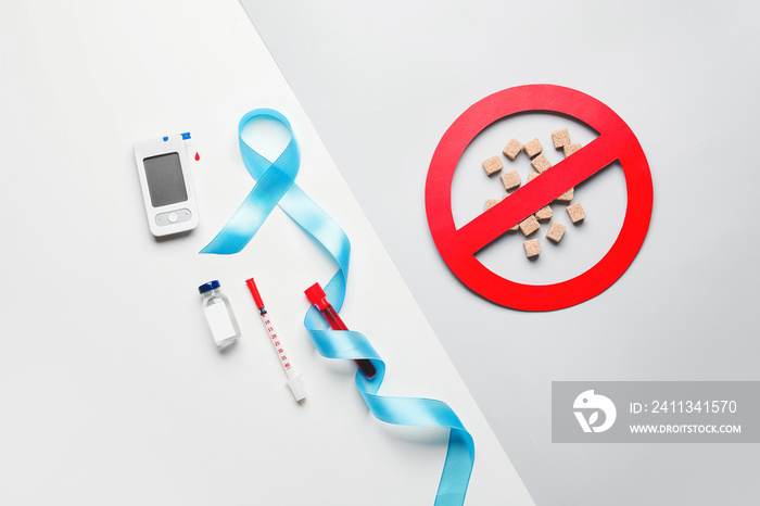 Composition with sugar, awareness ribbon, glucometer and insulin on light background. Diabetes concept