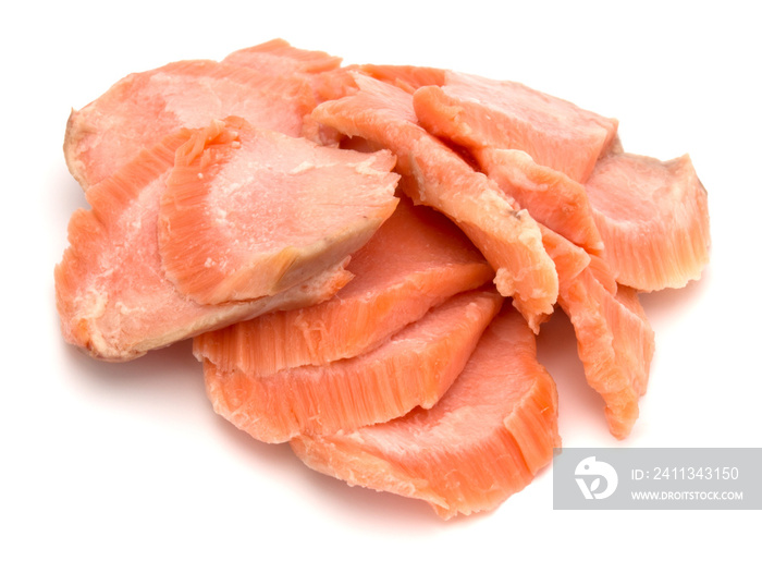 smoked salmon segments isolated on white background cutout. Prepared fish fillet fibres.