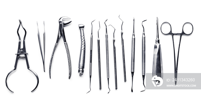 Different shiny metal medical tools isolated on white background