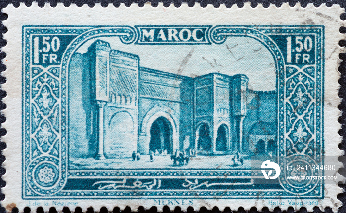 MOROCCO - CIRCA 1948: a postage stamp from MOROCCO , showing the Bab el Mansour building, Meknes. Circa 1948