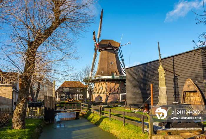 Historical dutch windmill in the Oudeschild village on the island of Texel