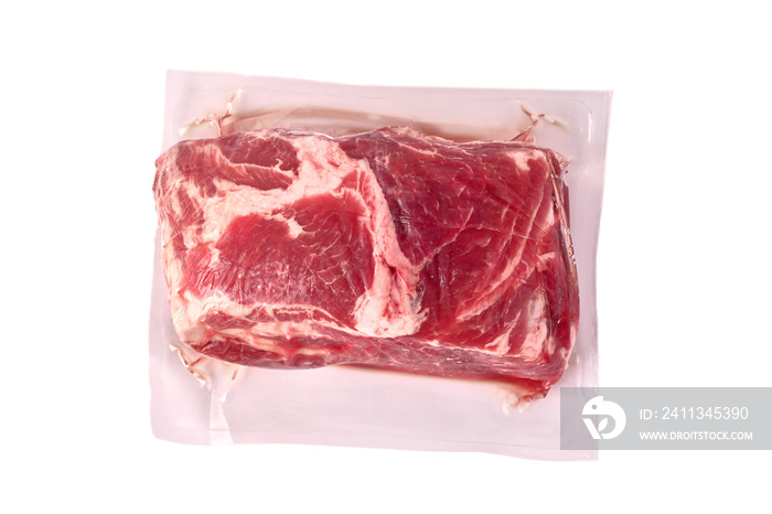 Raw meat, fresh pork vacuum-packed in polythene, isolated on white background. Top view.