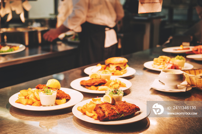 Food orders on the kitchen table in the restaurant