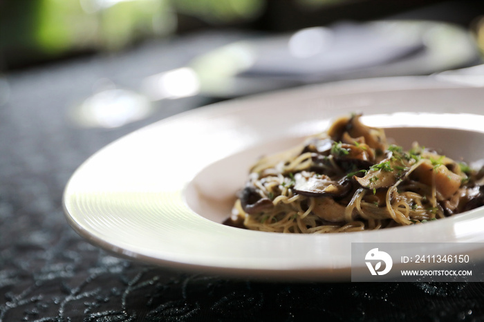 Spaghetti truffle cream sauce with mushroom