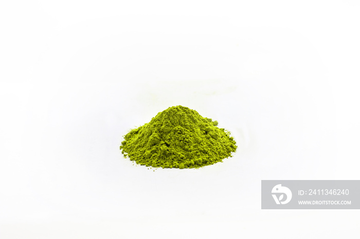 Heap of extract green Tea powder on white floor background.