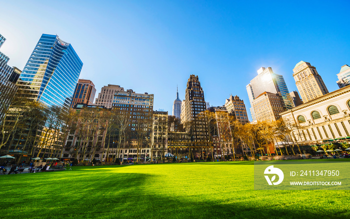 Skyline with skyscrapers and American cityscape in Bryant Park in Midtown Manhattan, New York, USA. United States of America. NYC, US.